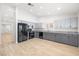 Modern kitchen with gray cabinets, stainless steel appliances, and ample counter space at 1515 Horizon Crest Ct, Henderson, NV 89012