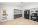 Updated kitchen with gray cabinets, stainless steel appliances, and wood flooring at 1515 Horizon Crest Ct, Henderson, NV 89012