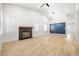 Spacious living room features a fireplace, wood floors, and abundant natural light at 1515 Horizon Crest Ct, Henderson, NV 89012