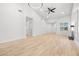 Open living area with wood floors, fireplace, and contemporary lighting at 1515 Horizon Crest Ct, Henderson, NV 89012
