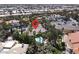 Wide aerial view of the property showcasing a backyard pool, mature landscaping and surrounding neighborhood at 1813 Skyline Dr, Las Vegas, NV 89117