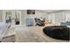 Large bedroom with patio access includes massage chair, desk area, and comfortable seating at 1813 Skyline Dr, Las Vegas, NV 89117