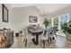 Dining room featuring a modern chandelier, neutral decor, and wood-look flooring at 1813 Skyline Dr, Las Vegas, NV 89117
