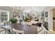 Open-concept dining room with a chandelier and windows adding natural light at 1813 Skyline Dr, Las Vegas, NV 89117