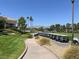 Neatly arranged row of golf carts next to the lush green fairway, with mountains visible in the distance at 1813 Skyline Dr, Las Vegas, NV 89117