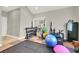 Spacious home gym featuring free weights, exercise ball, and rubber mat flooring for comfortable workouts at 1813 Skyline Dr, Las Vegas, NV 89117