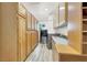Functional laundry room with plenty of cabinet storage and modern washer and dryer appliances at 1813 Skyline Dr, Las Vegas, NV 89117
