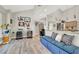 Cozy living room featuring wood-look flooring, modern decor, and a convenient beverage cooler at 1813 Skyline Dr, Las Vegas, NV 89117