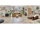 Bright living room with high ceilings, large windows, and stylish contemporary furnishings at 1813 Skyline Dr, Las Vegas, NV 89117