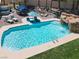 Inviting pool with rock waterfall and ample space for relaxation and recreation at 1813 Skyline Dr, Las Vegas, NV 89117