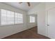 Bright bedroom with ample natural light, ceiling fan and closet with mirrored doors at 1835 Banaba Ln, Las Vegas, NV 89156