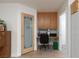 Office nook adjacent to the kitchen featuring custom cabinetry and a pantry at 1835 Banaba Ln, Las Vegas, NV 89156