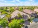 Aerial view of home with mature landscaping, pool, and tile roof at 2008 Aspen Oak St, Las Vegas, NV 89134