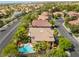 Aerial view shows backyard pool and neighborhood, mature trees, and home's prime location at 2008 Aspen Oak St, Las Vegas, NV 89134