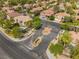 An aerial view of a well-maintained neighborhood showcasing lush landscaping and various home styles at 2008 Aspen Oak St, Las Vegas, NV 89134