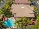Aerial view showcasing lush landscaping, backyard pool, spa, and outdoor living area, perfect for relaxation at 2008 Aspen Oak St, Las Vegas, NV 89134