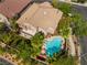 Aerial view showcasing a home with a pool, hot tub, patio area, and well-maintained landscaping at 2008 Aspen Oak St, Las Vegas, NV 89134