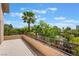 A spacious balcony features an ornate railing and tropical views with Palm trees at 2008 Aspen Oak St, Las Vegas, NV 89134