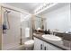 Bathroom featuring granite counters and a glass shower at 2008 Aspen Oak St, Las Vegas, NV 89134