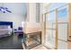 Bathroom with fireplace, large shower, and view into bedroom at 2008 Aspen Oak St, Las Vegas, NV 89134