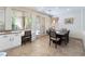 Bright dining area with a desk and a modern dining table set at 2008 Aspen Oak St, Las Vegas, NV 89134