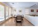Bright dining room with large windows and a modern dining table set at 2008 Aspen Oak St, Las Vegas, NV 89134