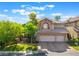 Charming two-story home with a three-car garage and mature trees at 2008 Aspen Oak St, Las Vegas, NV 89134