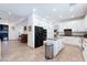 Open concept kitchen featuring granite countertops, island, and stainless steel appliances at 2008 Aspen Oak St, Las Vegas, NV 89134