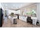 Bright kitchen with white cabinets, center island, and built in desk space at 2008 Aspen Oak St, Las Vegas, NV 89134