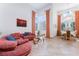 Bright and airy living room featuring tile floors, and an elegant lighting fixture at 2008 Aspen Oak St, Las Vegas, NV 89134