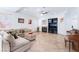 Inviting living room featuring a cozy couch, fireplace, and entertainment center at 2008 Aspen Oak St, Las Vegas, NV 89134