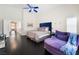 Comfortable main bedroom with blue accents and a chaise lounge at 2008 Aspen Oak St, Las Vegas, NV 89134