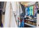 Organized walk-in closet with shelving and hanging storage at 2008 Aspen Oak St, Las Vegas, NV 89134