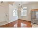 Inviting dining area featuring large windows and a stylish chandelier at 202 Twin Creek St, Henderson, NV 89074