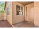 Inviting entrance with decorative security door, desert landscaping and plenty of natural light at 202 Twin Creek St, Henderson, NV 89074