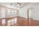 Bright living room featuring beautiful floors, and a glass patio door at 202 Twin Creek St, Henderson, NV 89074