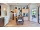 Comfortable dining area with stylish cabinets, perfect for Gathering meals and entertaining guests at 2107 Desert Woods Dr, Henderson, NV 89012