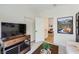 Comfortable living room leads to the bedroom and features stylish decor at 2107 Desert Woods Dr, Henderson, NV 89012