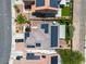 Aerial view of a property with solar panels, a patio, and a well-maintained lawn at 217 Turkey Creek Way, Henderson, NV 89074