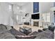 Inviting living room features a fireplace, modern furnishings, and bright, neutral colors at 217 Turkey Creek Way, Henderson, NV 89074