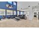 Spacious living room with high ceilings, tile flooring, and modern decor at 217 Turkey Creek Way, Henderson, NV 89074