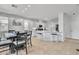 Spacious open-concept living area with kitchen, dining, and seating, perfect for Gathering gatherings at 217 Turkey Creek Way, Henderson, NV 89074
