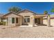 Backyard with a covered patio and low-maintenance desert landscaping at 2173 Point Mallard Dr, Henderson, NV 89012