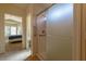 Bathroom featuring a shower stall, and partial view into bedroom at 2173 Point Mallard Dr, Henderson, NV 89012