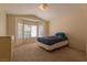 Bright bedroom with bay window and ample space for a cozy seating area at 2173 Point Mallard Dr, Henderson, NV 89012