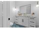 Elegant bathroom featuring a marble countertop vanity, modern light fixtures, and blue tile flooring at 2309 Prometheus Ct, Henderson, NV 89074