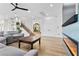 Bright, airy living room with hardwood floors and a view into the front yard at 2309 Prometheus Ct, Henderson, NV 89074