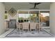 Charming outdoor dining area with seating for eight, perfect for alfresco meals and gatherings at 2309 Prometheus Ct, Henderson, NV 89074