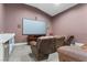 Inviting theater room with comfortable seating and entertainment center at 2309 Prometheus Ct, Henderson, NV 89074