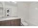 Clean bathroom featuring a single sink vanity, granite countertop, and a shower-tub combination at 2773 Green Envy Ave # 245, North Las Vegas, NV 89086